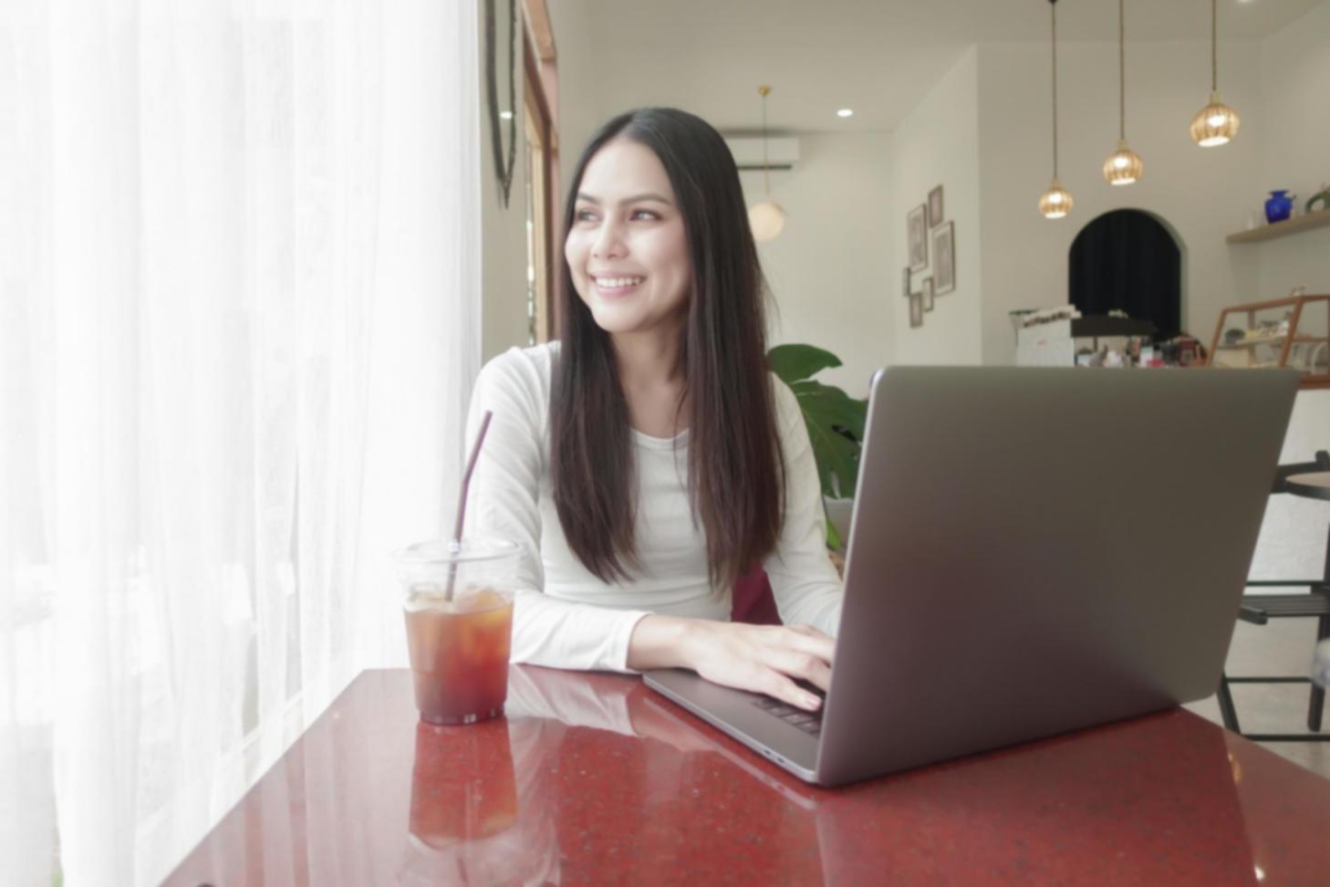 Professional analyzing financial reports with detailed documentation